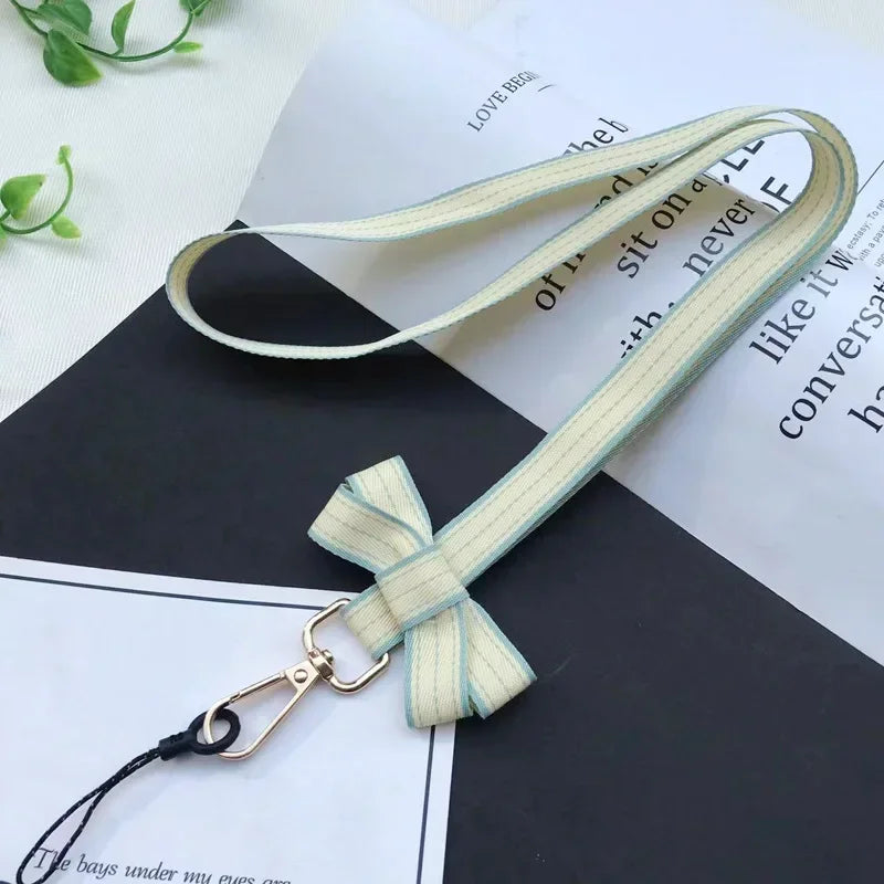 Koreanischer Chic Handy-Lanyard mit gestreiftem Bogen