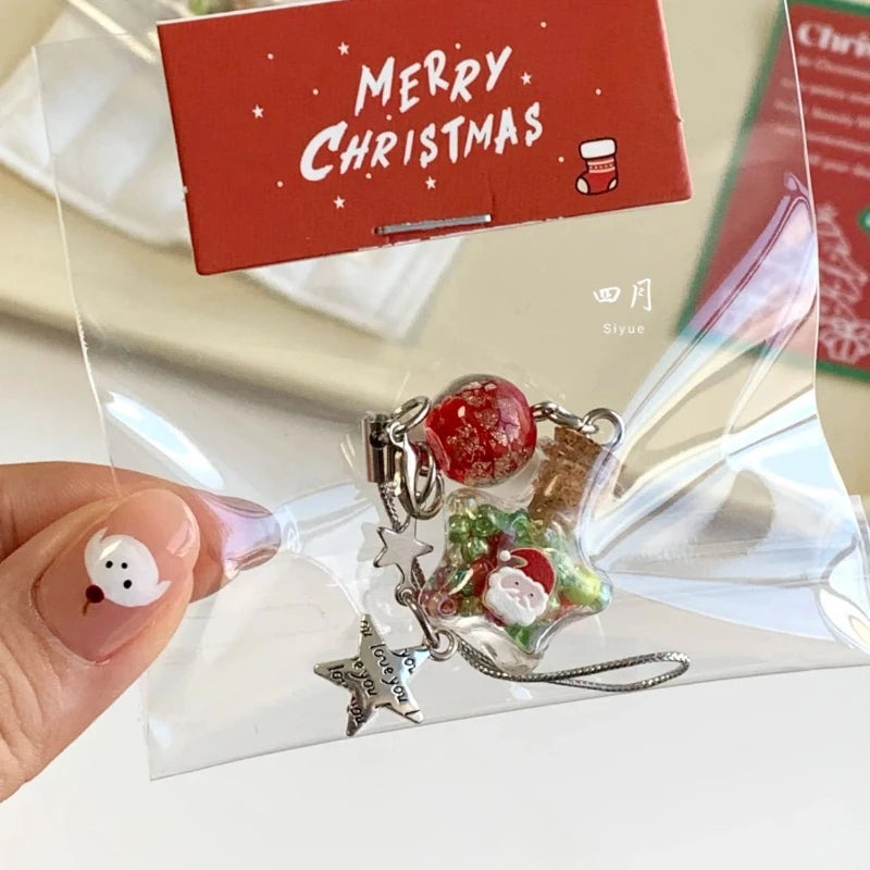 Weihnachtsstern Handy-Anhänger mit Wunschflasche