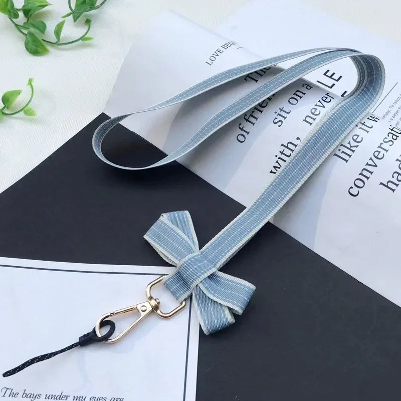 Koreanischer Chic Handy-Lanyard mit gestreiftem Bogen