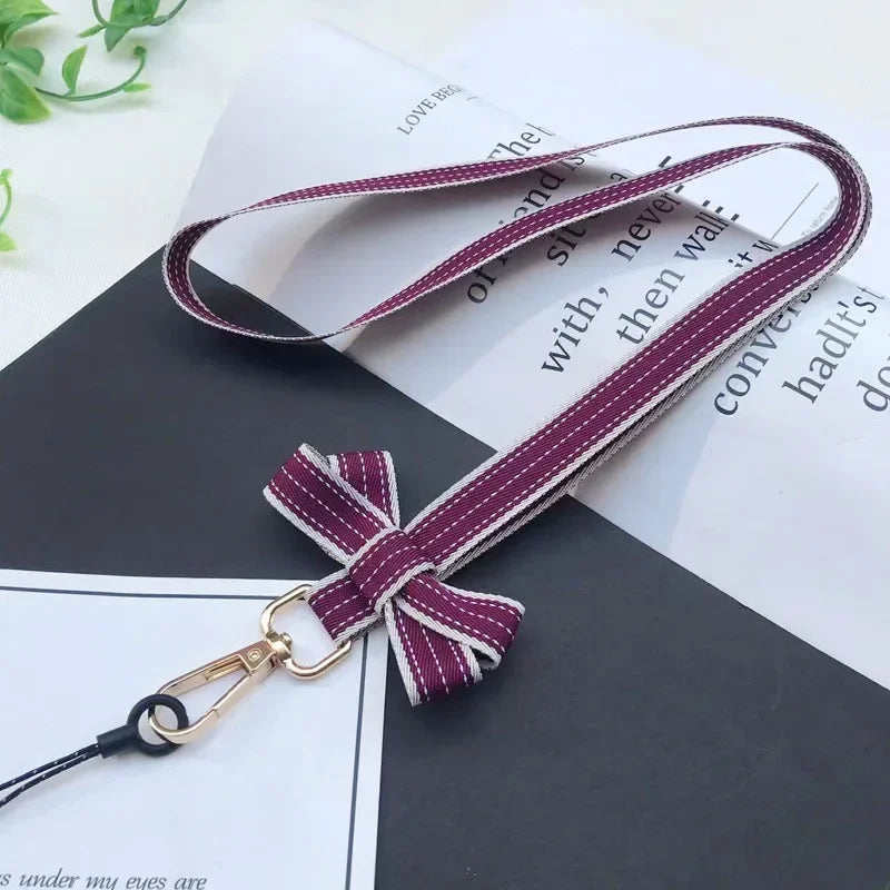 Koreanischer Chic Handy-Lanyard mit gestreiftem Bogen