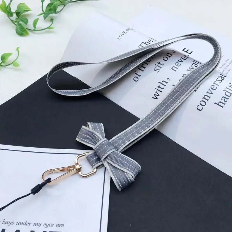 Koreanischer Chic Handy-Lanyard mit gestreiftem Bogen